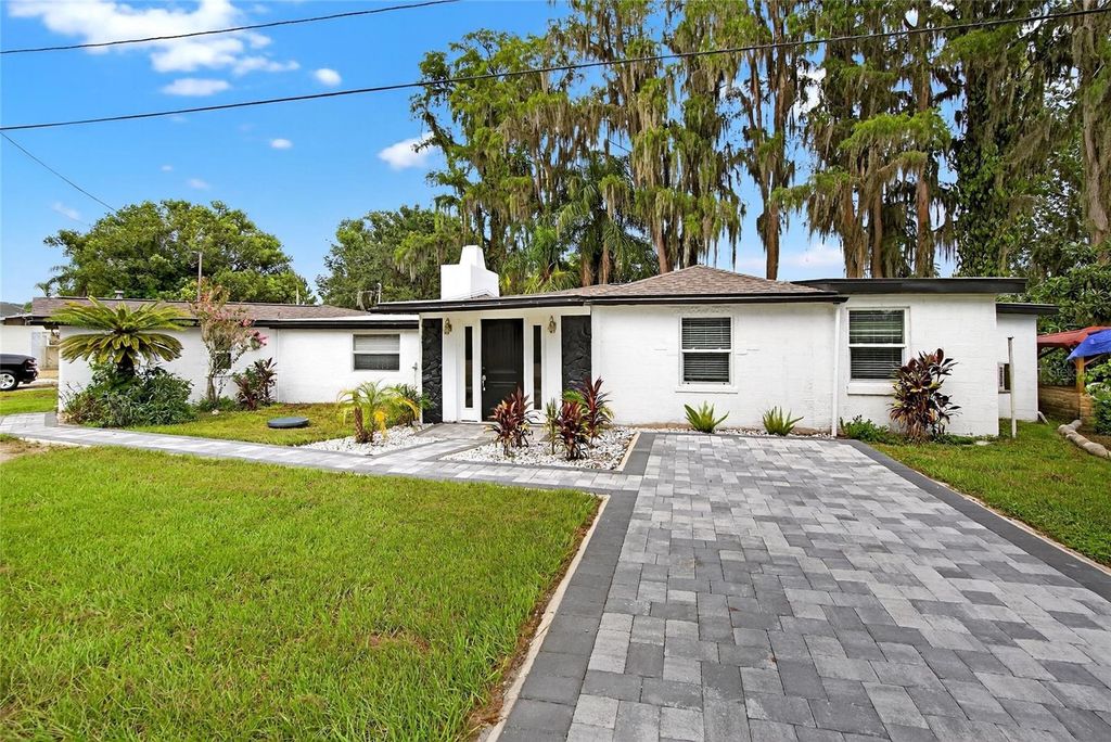 Photo of 5028 School Road, Land O Lakes, FL 34638 (MLS # TB8329709)