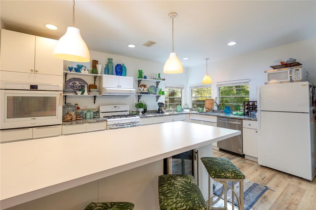 Photo of 310 NW 8th Street, Gainesville, FL 32601 (MLS # GC539005)