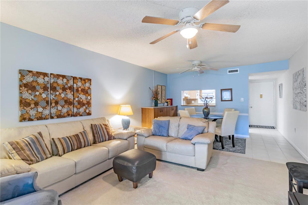 Photo of 2400 Winding Creek Boulevard #24-203, Clearwater, FL 33761 (MLS # TB8550684)
