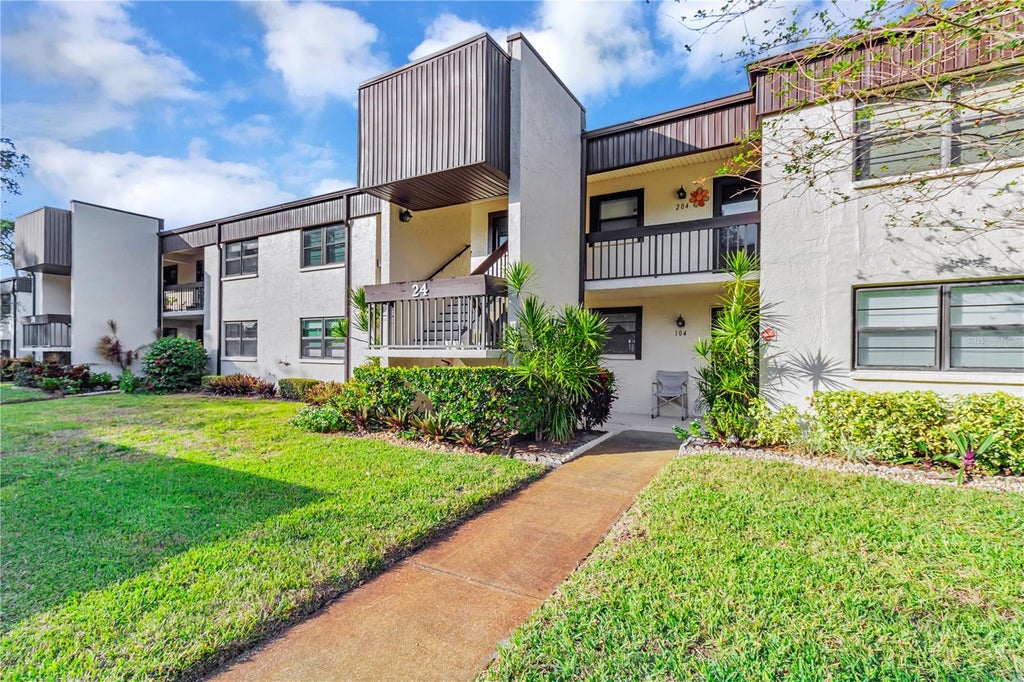 Photo of 2400 Winding Creek Boulevard #24-203, Clearwater, FL 33761 (MLS # TB8550684)