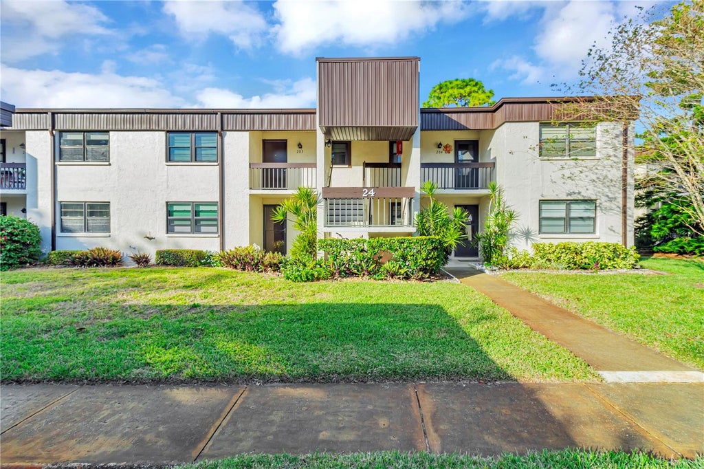 Photo of 2400 Winding Creek Boulevard #24-203, Clearwater, FL 33761 (MLS # TB8550684)