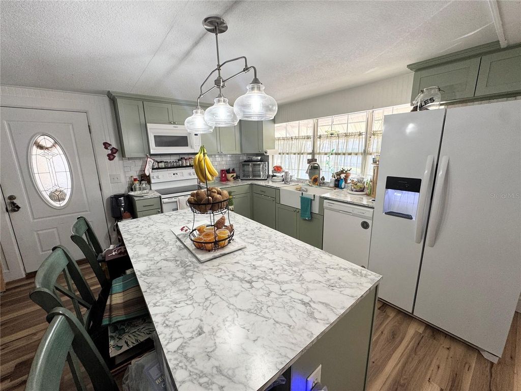 Photo of 38437 Beniger Drive, Zephyrhills, FL 33540 (MLS # TB8493030)