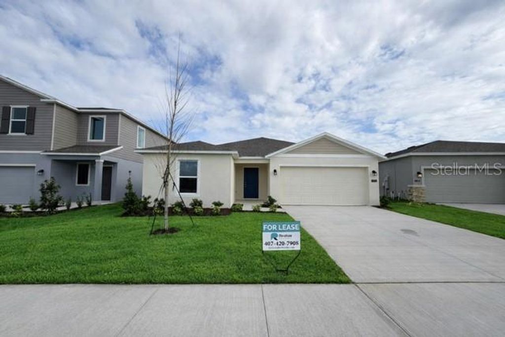 Photo of 1116 Tyler Loop, Winter Haven, FL 33884 (MLS # O6395894)