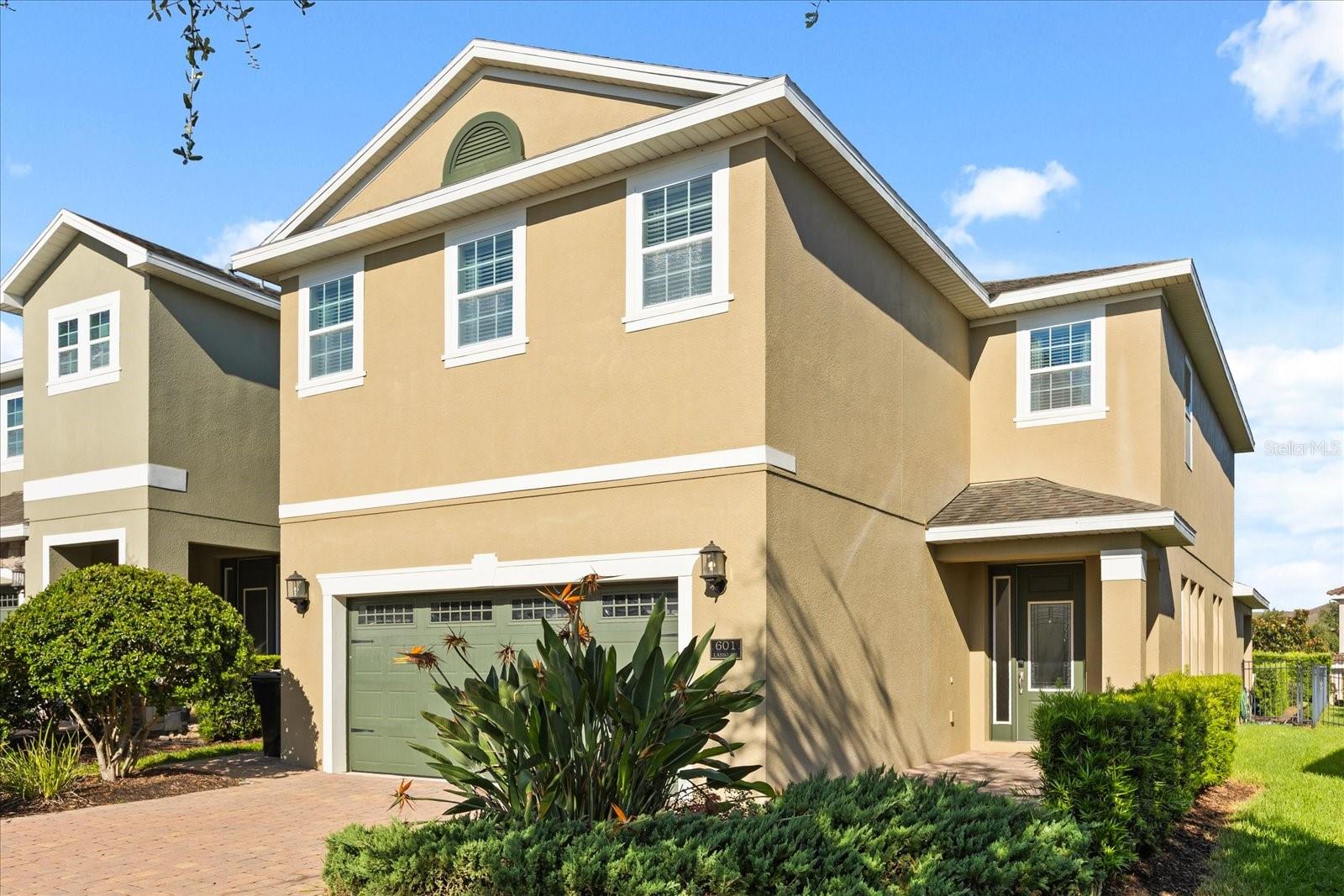 Welcome to this meticulously furnished 6-bedroom, 7-bathroom (5 full, 2 half) modern residence, built in 2016 and nestled within the exclusive Encore Resort at Reunion—an award-winning gated community just minutes from Orlando’s famed theme parks. Spanning 3,099 interior square feet, this home features a grand open floor plan that seamlessly blends high ceilings, flowing living and dining spaces, and a chef’s island kitchen adorned with granite countertops and upgraded stainless steel appliances. Enjoy the luxury of two private primary suites—one on the main level with direct pool access and a spa-like bath with twin vanities, a garden tub, and separate walk-in shower, and another upstairs for added flexibility. The upper level also offers extra living space and themed bedrooms—designed for Disney and Star Wars fans—that add a whimsical touch and perfect guest accommodations. Cleverly converted, the garage now serves as a movie and game room, delivering additional entertainment value. Step outside to your private West-facing backyard oasis, where a sparkling in-ground pool and heated spa await, surrounded by lush landscaping, a covered patio, and thoughtful amenities including a pool alarm for peace of mind. Lives come easy here with conveniences like inside laundry, central heating and cooling, ceiling fans, sliding doors, a reclaimed water irrigation system, and custom closet built-ins in all bedrooms. The home is sold fully furnished, turnkey, and ideal as a luxurious full-time residence, a second home, or a high-yield short-term rental. Encore Resort elevates life with unmatched amenities: enjoy a 10-acre water park complete with thrilling slides, a splash zone, and family water features; a clubhouse, fitness center, restaurants, indoor recreation, tennis, basketball, volleyball courts, and concierge services—truly a resort-style living experience. Book your showing now!