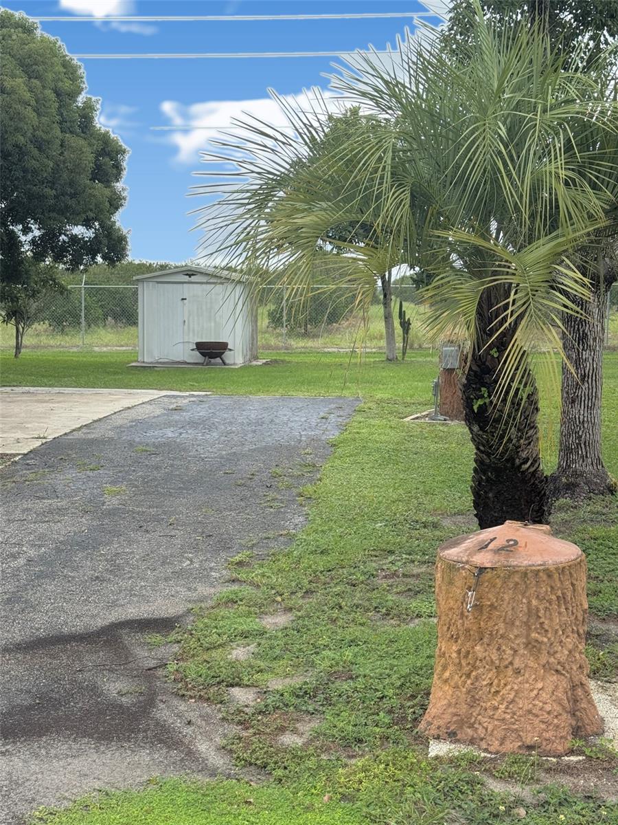 Photo of 12 Saddlebag Trail N, Lake Wales, FL 33898 (MLS # D6149053)