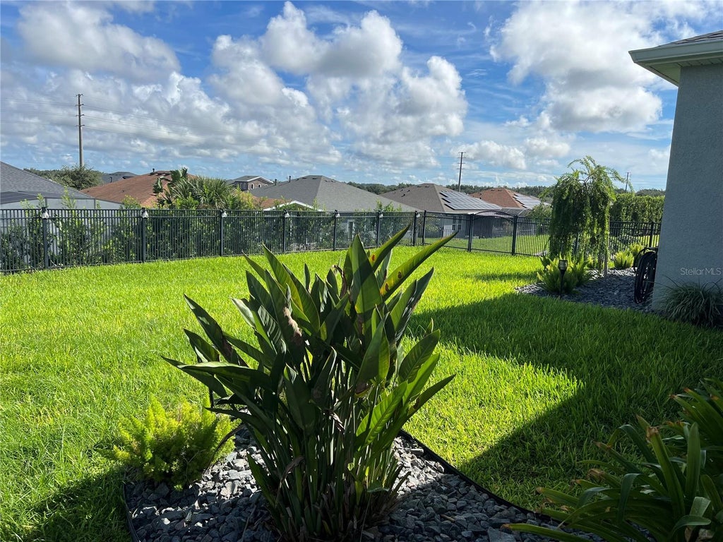 Photo of 649 Conservation Boulevard, Groveland, FL 34736 (MLS # C7530625)