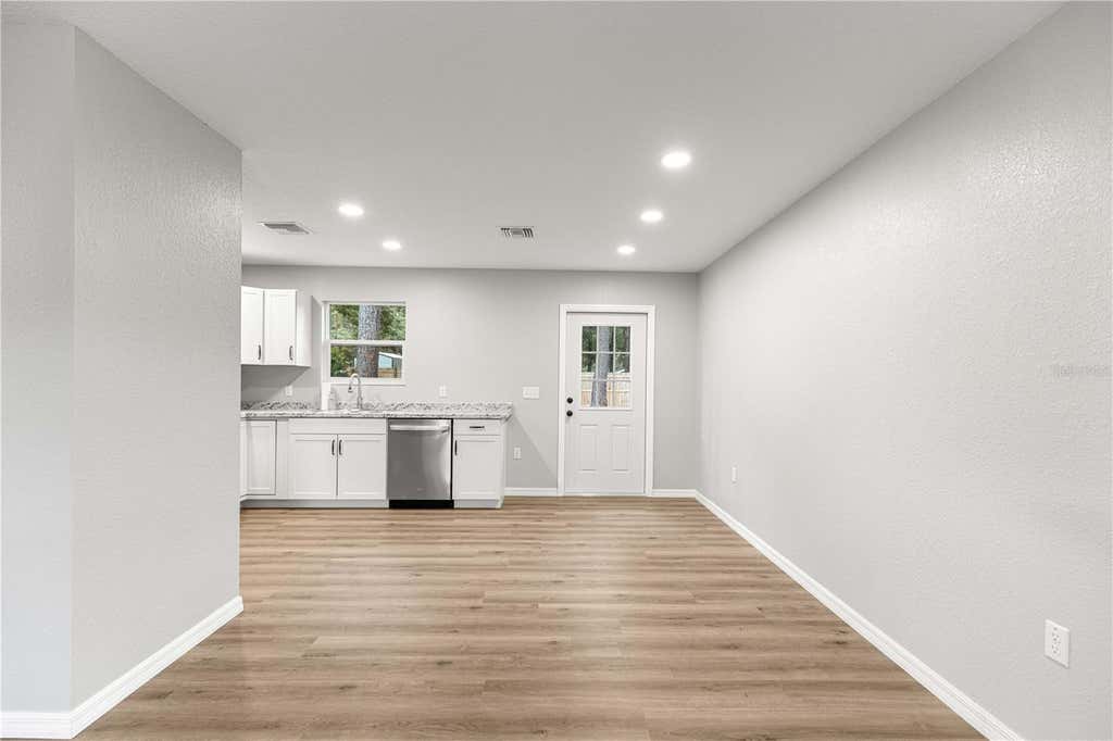 Photo of 11060 NE 145th Lane, Fort Mccoy, FL 32134 (MLS # OM729898)