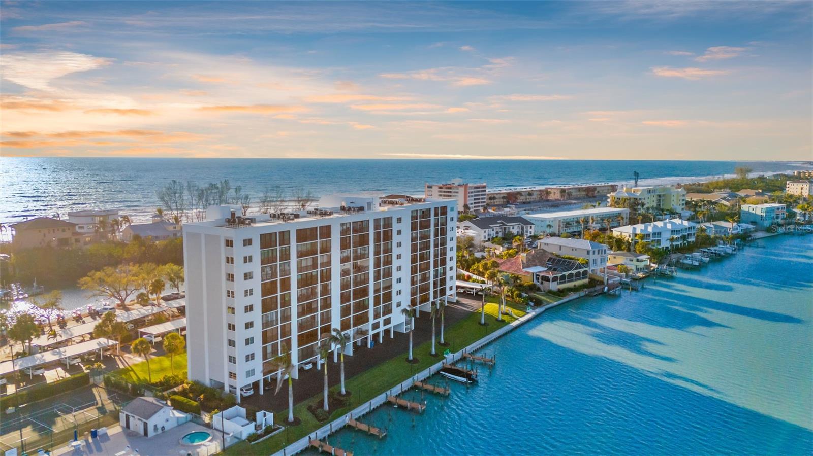 Stunning Water Views | The Pointe on Midnight Pass – Siesta Key
Welcome to The Pointe on Midnight Pass, a private, gated community on the coveted southern tip of Siesta Key. This 2-bedroom, 2-bathroom condo offers panoramic views of Little Sarasota Bay, Blind Pass Lagoon, and the Gulf — an exceptional opportunity to create your dream coastal retreat.
Enjoy breathtaking sunrise and sunset views from the living room, kitchen, dining area, and both bedrooms. The owner’s suite features an en suite bath and direct lanai access. Ample storage includes multiple closets and a private ground-level storage unit. Assigned covered parking and guest parking included.
This 5-acre waterfront community is surrounded by tropical lush landscaping and offers resort-style amenities:
• Heated pool & spa with bay views
• Lighted tennis & pickleball courts
• Fitness center, saunas & clubhouse
• Kayak storage with 3 launches
• Boat slips with water, electric & fish cleaning station
• Private island gazebo with BBQ area
• Butterfly & herb gardens, bike storage, and social events (Jan–Apr)
• On-site management and maintenance
Located near Turtle Beach, Crescent Beach, and Siesta Key Beach with easy access to the free Breeze Trolley and both North & South Villages.
This unit is ideal as a full-time residence, snowbird getaway, or investment property. Live the Siesta Key lifestyle you’ve been dreaming of!
Schedule your private showing today!