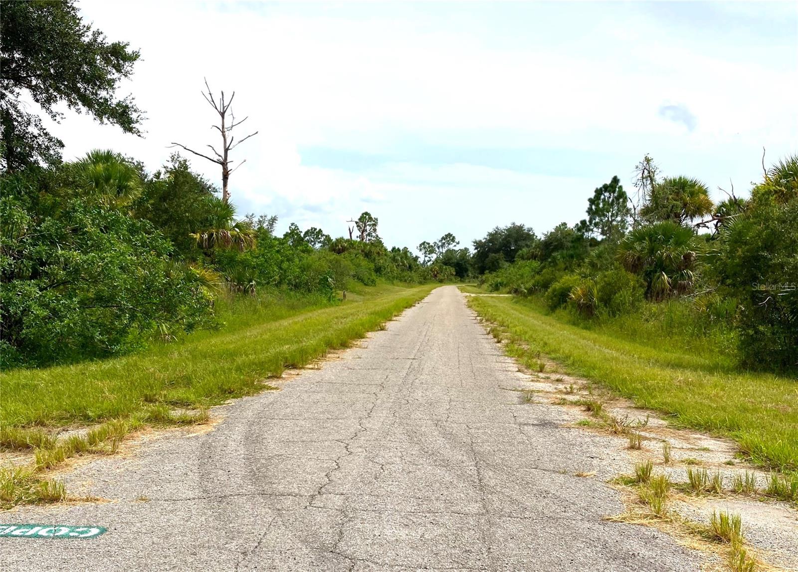 Build your new home on this lot in North Port, a fast growing city in Florida, close to Port Charlotte and Punta Gorda, but part of the Sarasota County School District. The lot is located minutes away from I-75 and US-41 Hwy for an easy commute to Sarasota and Fort Myers. Conveniently located close to parks, hospitals, shopping, dining and entertainment such the Braves Spring Training Stadium, the new Aquapark and the Myakka River and preserves. North Port is a short drive to the stunning beaches on the Gulf of Mexico such as Siesta Key Beach and Venice Beach. And for the more adventures ones, there is camping, fishing, biking, boating, hiking and horseback riding nearby. For golf lovers there is the Kings Gate Golf Club and Maple Leaf Golf & Country Club. The lot is located in a preferred flood zone X and is not a Scrub Jay area. No HOA fees. If you need help finding a builder, we can help.