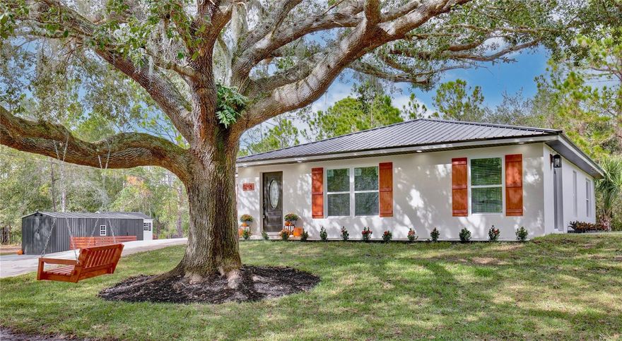 Motivated Sellers, open to all offers! Experience this fully renovated 5-acre, country retreat, located in Geneva where acreage meets proximity to convenience. This home is zoned for A-rated Seminole County Schools, offering a rare combination of private, country living and top-tier educational opportunities. The interior has been meticulously updated with an intentional farmhouse aesthetic that is warm and cozy, yet neutral enough for new owners to imprint their own style and make it uniquely theirs.  This split floor plan offers 4-bedrooms, 2-baths, and an additional office/bonus room with a new sliding door that provides a tranquil view of the property--perfect for focus (or daydreaming). 

Renovation Highlights: New HVAC, windows and doors, updated plumbing and electrical, tankless water heater (2025), water-filtration system (2025), 25-yr+ metal roof (2025), LVP flooring (2025), and new washer/dryer.

Kitchen - Real wood, soft-close cabinets, and all new stainless steel appliances.  The pantry has been expanded and boasts custom shelving.  

Primary en suite bathroom - Walk-in closet, jack/jill vanity, and double shower stall

Exterior - A new, 12x20 detached 1-car shop and a practical 8x12 storage shed flank the hardscape patio, anchored by a built-in firepit for evening gatherings. And for quiet moments, a classic swing hangs from the grand oak tree out front, perfectly positioned for watching spectacular western sunsets.

This property combines the peace and potential of country living with the confidence of a comprehensive, no-project-needed renovation. It’s more than a house; it’s a turn-key homestead ready for the next chapter.  Not to mention the A-rated school system Schedule an appointment to experience 1255 Flint Trail for yourself.