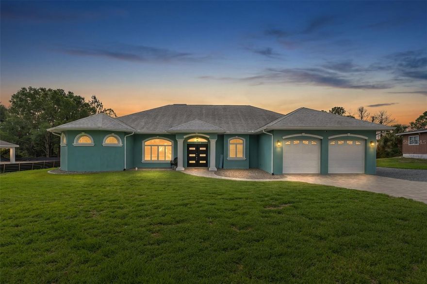 Welcome to this stunning 2007-built custom home offering 3,612 square feet of beautifully designed living space with 4 bedrooms, 3 bathrooms, and an exceptional split floor plan perfect for both everyday living and entertaining. From the moment you walk in, you’ll be impressed by the soaring ceilings, expansive open layout, and upscale finishes throughout.

The heart of the home is the drop-dead gorgeous chef’s kitchen featuring a massive double-wide quartz island, abundant cabinetry, a unique butlers area and seamless flow into the living and dining areas. The spacious living room is anchored by a beautiful wood-burning fireplace, creating a warm and inviting focal point for gatherings and cozy evenings at home.

The luxurious primary suite is privately situated and offers a spacious retreat complete with a spa-inspired ensuite featuring a relaxing soaker tub, an oversized walk-through double shower, dual vanities, and a large open walk-in closet.

On the opposite side of the home, you’ll find three additional bedrooms thoughtfully arranged for privacy and convenience. Two bedrooms share a Jack-and-Jill bathroom, while the third is located next to a full pool bath with direct outdoor access.

Step outside to your own backyard paradise featuring a beautiful paver pool installed in 2017 overlooking a peaceful summer lake setting. Additional highlights include a rear laundry room, oversized double garage with extra workspace, and a detached shed perfect for lawn equipment or extra storage. To make this home even more impressive you have a whole home solar system to make those electric bills very low.

This impressive property combines luxury, functionality, and serene waterfront living all in one extraordinary package.