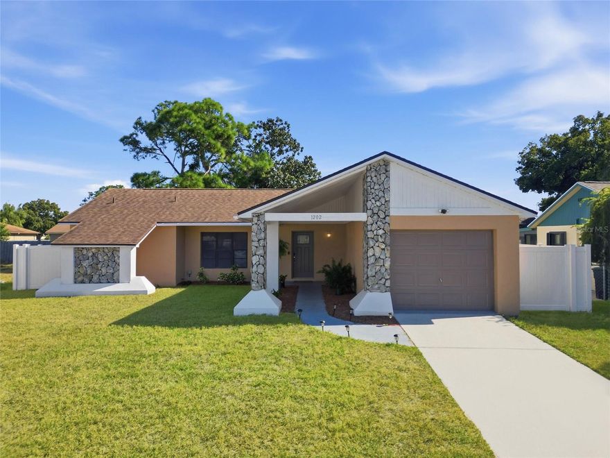 Welcome to this beautifully renovated 2-bedroom, 2-bath home perfectly located in the heart of Holiday, Florida. From the moment you arrive, you’ll appreciate the inviting curb appeal, fresh exterior updates, and the pride of ownership that shines throughout the property. The roof was replaced in 2019 and AC in 2021, offering added confidence and long-term durability.

Step inside to a bright, open layout enhanced by modern finishes and thoughtful upgrades. The entire home features brand-new tile flooring installed in 2024, giving every room a clean, cohesive, and updated look. The spacious living area flows seamlessly into the dining space, creating an ideal setting for both everyday living and easy entertaining.

The newly renovated kitchen showcases stylish cabinetry, updated countertops, and ample storage—designed to make cooking efficient and enjoyable. Both bedrooms provide generous space, natural light, and excellent closet storage. The two beautifully updated bathrooms were fully renovated in 2023 with new fixtures and stunning tile surrounds, giving the home a fresh, contemporary feel throughout.

Major improvements provide true peace of mind, including paid-off solar panels, a brand-new paved patio installed in 2024, and a new privacy fence installed in 2024—perfect for relaxing outdoors, hosting gatherings, or creating your own private Florida oasis.

Recent renovations throughout ensure a move-in-ready experience from day one. The outdoor space offers plenty of room for gardening, lounging, or customizing your dream backyard retreat.

Conveniently located just minutes from shopping, dining, parks, and the Gulf Coast’s beautiful beaches, this home blends modern comfort with everyday convenience—ideal for full-time living, seasonal stays, or investment.

This stunningly updated home is truly a must-see—schedule your showing today!