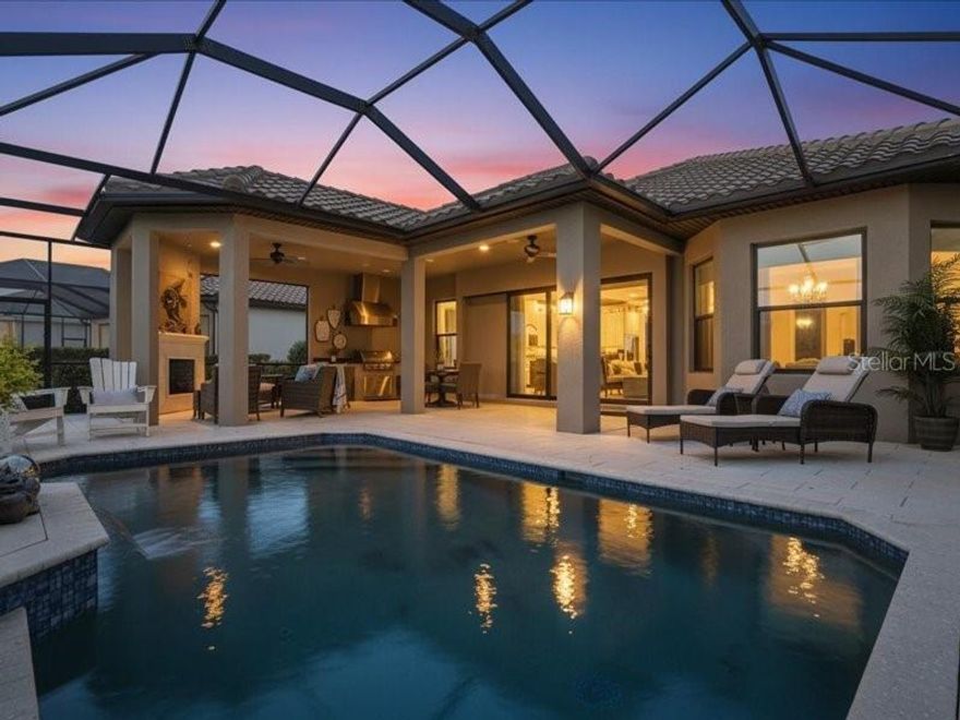 Most people see a house; the wise buyer sees the checklist of things they won't have to deal with for the next twenty years. This is the "over-spec" estate of Esplanade, fully loaded and ready for immediate delivery.
The story of 6243 Plateau Ct begins where builder standards end. While the neighbors were settling for "base models," this home was being transformed into an architectural fortress. It starts with the Glass Shield—a six-figure investment in architectural-grade hurricane glass that doesn't just stop storms; it hits the "mute" button on the outside world, leaving you in a library-quiet sanctuary that costs a fraction of the price to cool.
Step inside, and the "cookie-cutter" feel is nowhere to be found. The heart of the home features a Chef’s Reset, where standard cabinets were tossed aside for a full custom cabinetry overhaul. It’s a kitchen designed for people who actually cook, surrounded by feature walls and custom trim that lead you toward the home's biggest secret: The 3 to 4-Bedroom Flex. On paper, it’s a spacious two-bedroom, but the two massive, built-in flex rooms mean you can host a full house or retreat to a private office without ever feeling cramped.
When the sun starts to dip over the lake, the real magic happens on the lanai. Most Florida homeowners are forced back inside when the biting midges arrive, but here, you’re protected by an Invisible Fortress. The panoramic "No-See-Um" mesh keeps the view crystal clear and the bugs and  dander out of the picture. Whether you’re floating in the gunite pool—kept at a perfect temp by the new Pentair hybrid heater—or enjoying the rare glow of the natural gas fireplace, the outdoor lifestyle here is effortless.
From the new seamless gutters to the total interior and exterior refresh, every "to-do" list item has already been checked. The logic is simple: you can spend the next eighteen months in permit hell, fighting contractors to build this dream—or you can move into the one that’s already been perfectedPerfectly positioned, the property is just a short drive from UTC restaurants and shops, Mote Marina, Topgolf, and Siesta Key—voted the #1 beach again in 2026—as well as Lido Key, St. Armands, Longboat Key, and Anna Maria Island.
The smartest buy in Esplanade is waiting. Come grab the keys and start the next chapter.