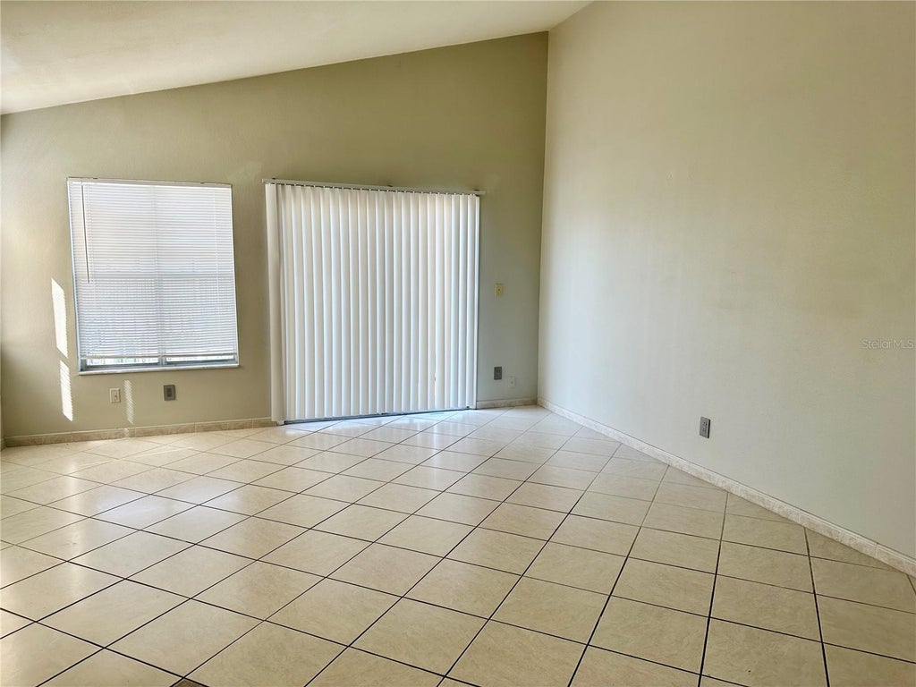Photo of 2524 Woodgate Boulevard #201, Orlando, FL 32822 (MLS # O6440652)