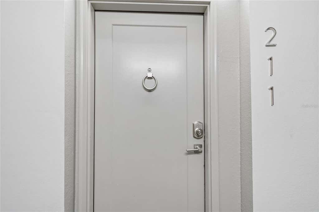 Photo of 400 Island Way #211, Clearwater Beach, FL 33767 (MLS # TB8511728)