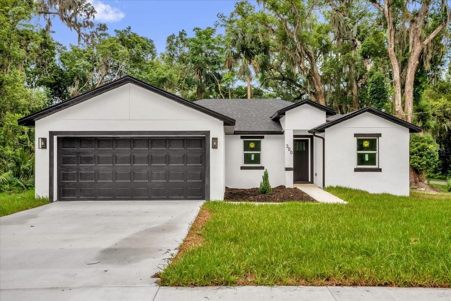 Welcome to your slice of Florida paradise at 300 Cherokee Ave in Orange City. This beautifully crafted new construction home offers the perfect combination of modern elegance, thoughtful design, and everyday comfort.

Featuring 3 spacious bedrooms, 2 stylish bathrooms, and a versatile flex space ideal for a home office, study, or reading nook, this home was designed with functionality and lifestyle in mind. From the moment you walk in, you’ll appreciate the bright open-concept layout, ceramic tile flooring throughout, and the seamless flow between living, dining, and kitchen spaces.

The kitchen is truly the heart of the home, showcasing solid wood cabinetry, sleek finishes, and ample counter space perfect for cooking, entertaining, or gathering with family and friends. Both bathrooms feature stunning high-gloss tiled showers that add a modern luxury feel, while ceiling fans in every bedroom provide year-round comfort.

Step outside and unwind on the wood deck overlooking the spacious backyard — an ideal setting for entertaining, relaxing evenings, gardening, or future outdoor enhancements.

One of the standout features of this location is its proximity to nearby walking and biking trails, perfect for enjoying morning jogs, evening strolls, and the natural beauty Florida has to offer.

Located in a quiet neighborhood just minutes from Orange City’s Historic District, scenic Mill Lake Park, local shopping, dining, and major roadways, this home offers convenience while maintaining a peaceful residential feel.

Whether you're a first-time homebuyer, downsizing, or searching for a strong investment opportunity, this property delivers style, comfort, and value all in one.

Schedule your private showing today and discover everything 300 Cherokee Ave has to offer.