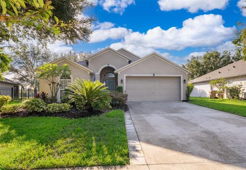 Photo of 30006 Pga Drive, Sorrento, FL 32776 (MLS # O6378465)