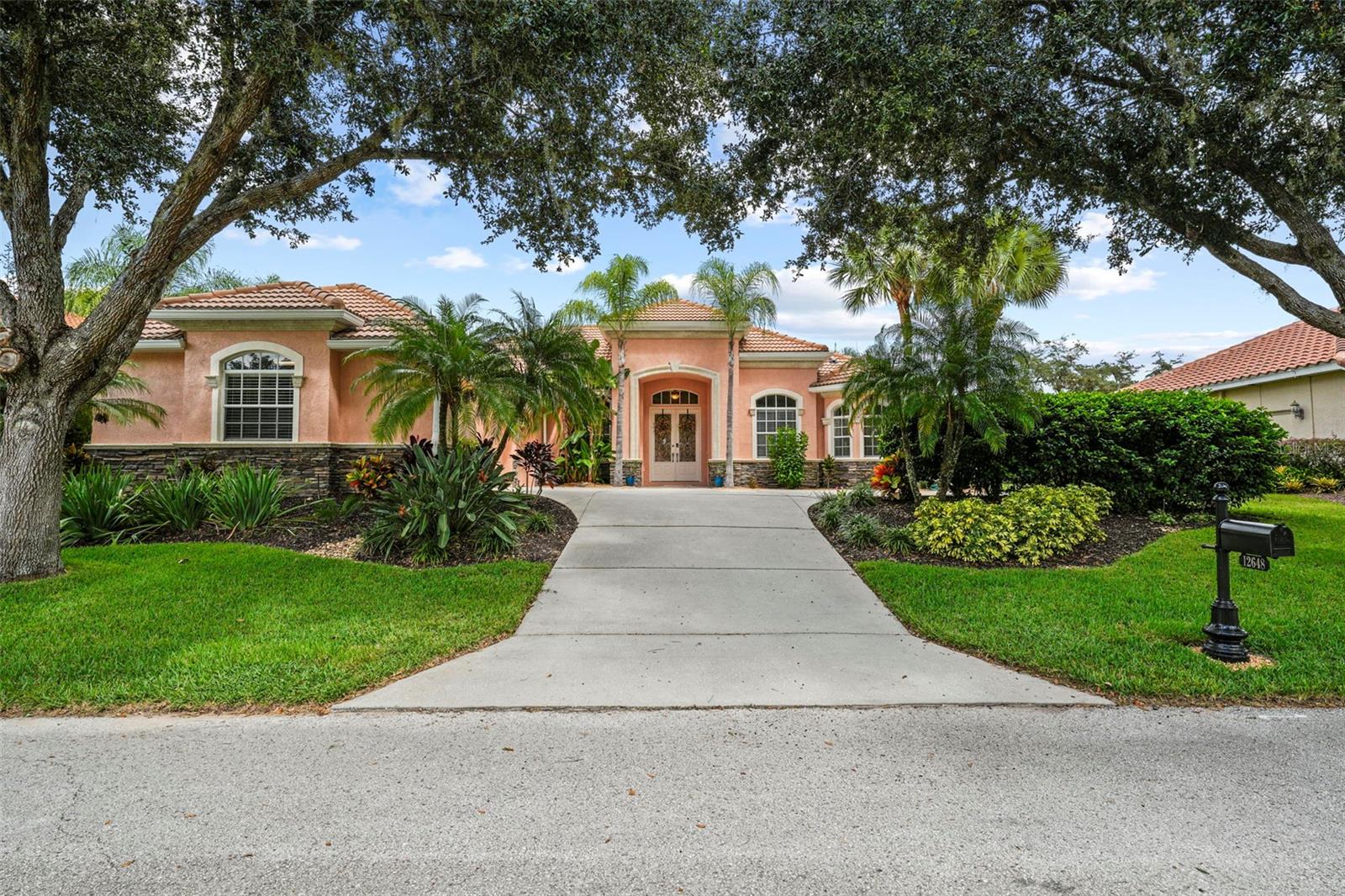 If you have been searching for a FLORIDA LIFESTYLE that embraces the BEST OF TAMPA BAY LIVING from GOLF to BEACHES to OUTDOOR ACTIVITIES to AMAZING DINING and ENTERTAINMENT… search no further… we have the best kept secret for you in Lake Jovita Golf and Country Club! Welcome to 12648 LAKE JOVITA BLVD… a POOL home that exudes pride in ownership and offers thoughtful one-story living in a 4 bedroom, 3 full bath, 3 car side load garage POOL with serene views of lush greens of Lake Jovita Golf South Course (Hole 9). Beautiful completely UPDATED kitchen including refinished cabinetry, and all new countertops, backsplash, and appliances - open to breakfast nook and family room with fireplace - tile floors throughout main living areas. Comfortably elegant with formal dining and living spaces, a private HOME OFFICE, nicely sized secondary bedrooms and beautiful primary suite that connects to the outdoor covered lanai - lovely for indoor - outdoor living - don’t miss the outdoor kitchen and custom bar with panoramic views of the golf course! The multiple conversation spaces in this home make it just so nice for entertaining, whilst preserving a sense of coziness and privacy. Additional wise owner investments include new HVAC and water heater. The natural light is fantastic and location of this home is ideal as it is on an incline, on a special one-way side street separated by landscaped median, minimizing through traffic. Lake Jovita Golf & Country Club is an amenity rich community with security guard gated access, clubhouse, swim, tennis, pickle ball, basketball, playgrounds, paved hiking trails and a fenced doggy park! Of course it is home to two of the most highly regarded golf courses and is a stone’s throw from St. Leo’s University, and easy access whether heading into Tampa or Wesley Chapel or Orlando! The options for fun are endless when living in Lake Jovita! Showings by appointment - please schedule today!