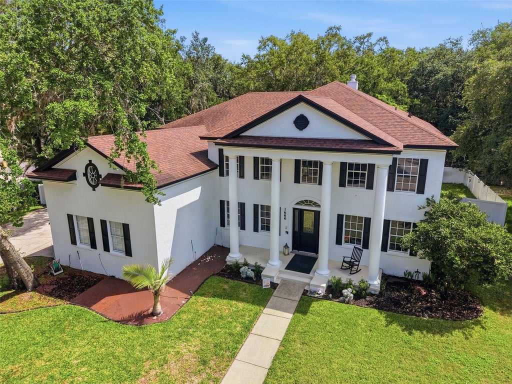Photo of 1666 Marina Lake Drive, Kissimmee, FL 34744 (MLS # O6401678)