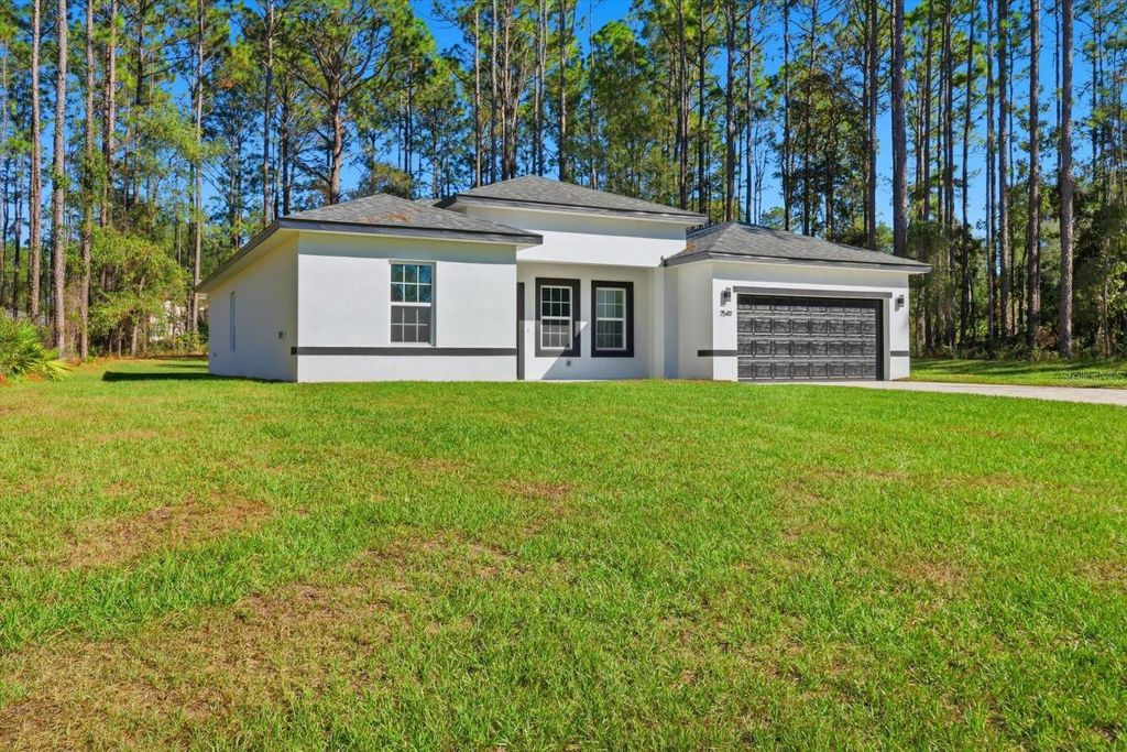 Photo of 7549 N Santos Drive, Citrus Springs, FL 34434 (MLS # OM712125)