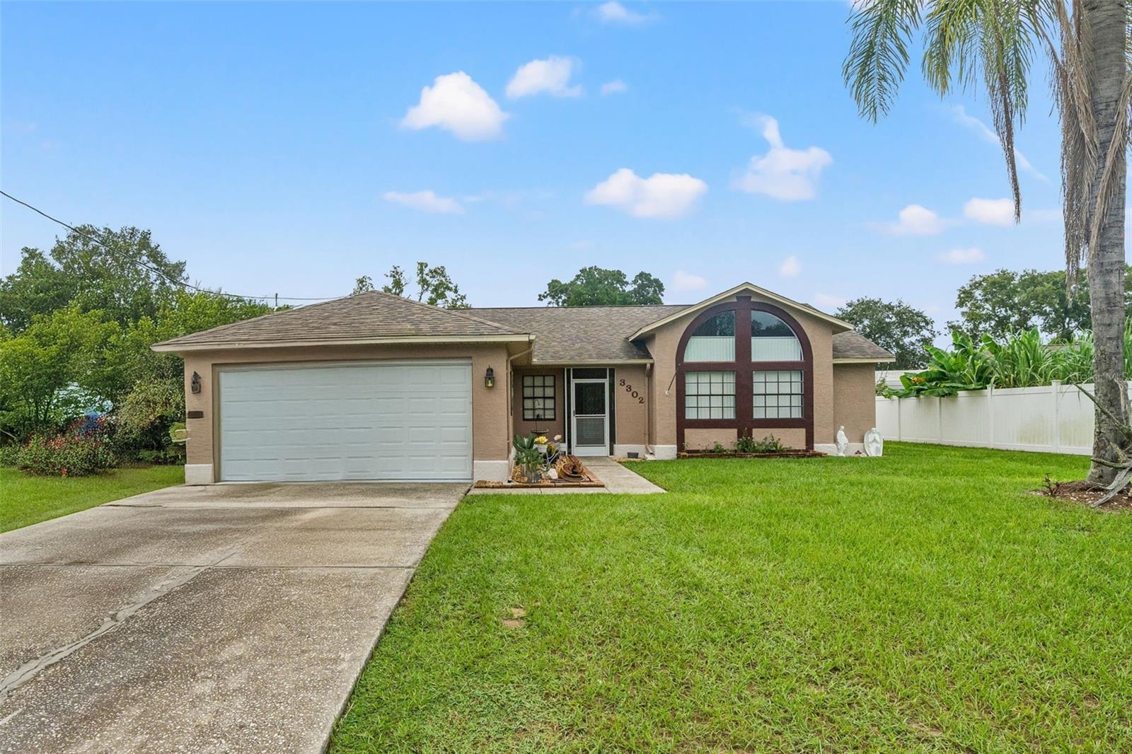 Welcome to this spacious 4-bedroom, 2-bathroom home in the heart of Spring Hill, perfectly set on over a quarter-acre with no HOA or CDD! From the moment you walk in, the thoughtful split floor plan offers both privacy and functionality.
The primary suite is your private retreat, complete with a walk-in closet, dual sinks, and direct access through sliding glass doors to a peaceful open patio—perfect for morning coffee or evening relaxation. The kitchen is designed for both everyday living and entertaining, featuring a cozy breakfast nook, breakfast bar, and plenty of counter space, while a formal dining area is ready for gatherings with friends and family.
Enjoy indoor-outdoor living with sliding glass doors leading from the living room to the enclosed Florida room. With its own AC and a wall of windows stretching across the space, it’s the perfect spot to relax year-round. Step outside to a second open patio and take in the large fenced backyard, ideal for pets, play, or hosting BBQs. A huge storage shed provides even more flexibility for hobbies, tools, or outdoor gear.
All of this, plus a prime location close to shopping, dining, entertainment, and an easy drive to the Veteran’s Expressway, makes this home an incredible opportunity.