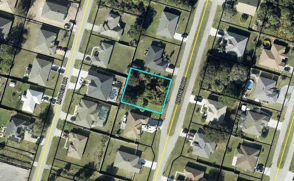 Photo of 90 Luther Drive, Palm Coast, FL 32137 (MLS # FC319092)