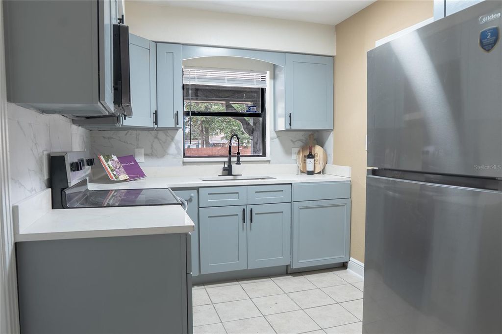 Photo of 5831 Hornet Drive, Orlando, FL 32808 (MLS # O6378927)