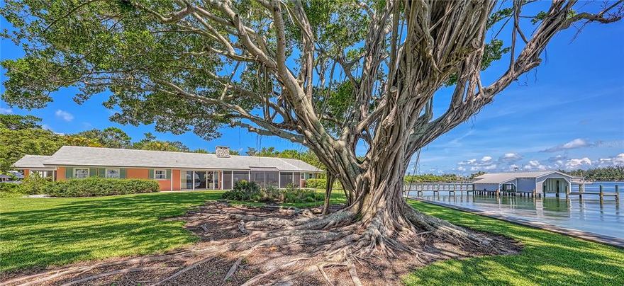 This unique bayfront property is perfectly positioned in a secluded spot on Longboat Key's north end. Offering limitless opportunities for the boating enthusiast, this three-bedroom cottage rests on an oversized 3/4-acre lot with lush, manicured grounds, more than 160" of water frontage, newer (2015) seawall encompassing the original seawall, capped 6" higher, plus unobstructed bay access, and a recently rebuilt (2013) boathouse with updated pilings, composite decking, as well as room to dock three vessels and add multiple lifts.