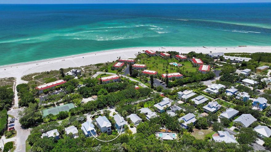 Nestled within prestigious Conrad Beach, a community acclaimed as "Community of the Year" by Coastal Magazine in 2001, this exceptional home is located mere steps away from the powdery white sands and azure waters of the Gulf of Mexico. Custom built in 2015, this distinctive residence offers a seamless blend of coastal style and high quality craftsmanship. The light and bright floor plan is surrounded by windows and sliding glass doors. Four separate covered balconies allow you to capture soft island breezes at any time of day. With impeccable attention to detail the interior design features wood floors, travertine stone accents, crown molding, exquisite quartz and granite countertops. The spacious kitchen with a generous center island flows seamlessly into an inviting living room which opens up to an expansive covered deck perfect for enjoying outdoor dining and entertaining. Constructed with quality in mind, this home boasts three levels of concrete block, cement board siding, a durable metal roof, impact-resistant windows and doors, a private elevator to all living levels as well as a fire sprinkler system for enhanced safety. Thoughtful energy-efficient elements include a 15 SEER AC system, low-E windows, and spray foam insulation in the attic. Your maintenance-free lifestyle awaits as the HOA fees encompass a range of services, including access to a heated community pool, lawn care, trimming, and basic cable. Additionally, this home is offered turn-key furnished allowing for an immediate embrace of the island lifestyle!