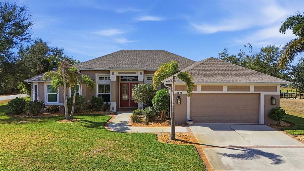 Photo of 13575 Chenille Drive, Port Charlotte, FL 33981 (MLS # C7521627)