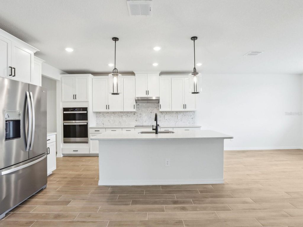 Photo of 1705 Draughton Drive, Zephyrhills, FL 33541 (MLS # O6371209)