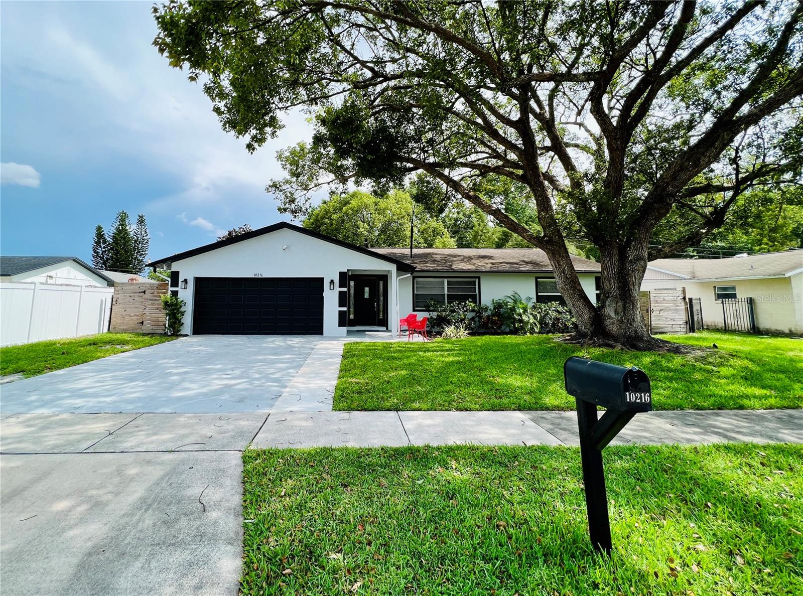 Under contract-accepting backup offers. Come live in style in this tastefully renovated “designer like” home; This 4 BEDROOM 2 BATHROOM home will amaze you by its balance of fashion and practicality. It has all the current upgrades such as , remodeled kitchen granite counter tops and stainless steel appliances, His and Hers walk-in closets in Master bedroom, reset lights and knockdown ceilings through the home (no popcorn ceiling!), tankless water heater (2022), AC Unit (2022), oversized shed included (10x20), connection plug for RV and generator, upgraded fuse box, etc. The WOW factor of this home would be the secret safety room and the general spaciousness. There is also a covered lanai, and the backyard is shaded by trees so it is perfect for enjoying a summer evening, there is also a shed and it comes with the home. It also has enough space to bring a boat and an RV through the side of your house and still keeping it fenced. Schedule a showing before it’s too late.