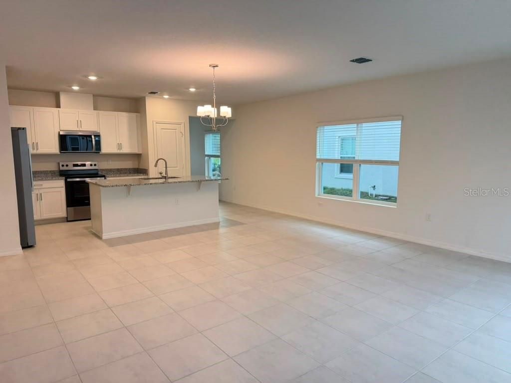 Photo of 16615 Luminary Loop, Clermont, FL 34714 (MLS # O6411304)