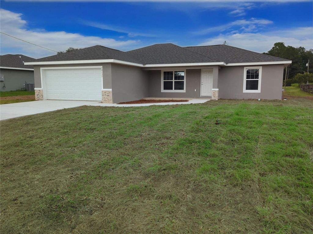 Photo of 10135 SW 130th Terrace, Dunnellon, FL 34432 (MLS # OM704393)
