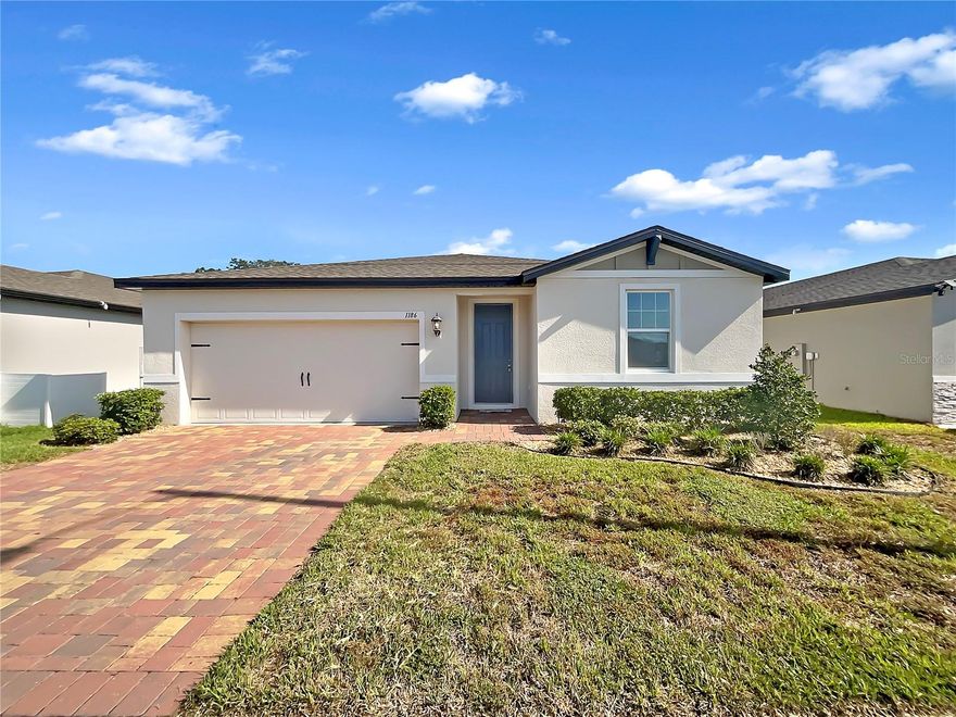 This stunning home offers a natural color palette and great flexible living space, perfect for any lifestyle. The kitchen is equipped with a center island and plenty of storage, while the primary bathroom features double sinks and great under sink storage. There is a sitting area in the backyard for relaxing and entertaining. This home is the perfect combination of style and comfort, and you won't want to miss it. Come take a look and fall in love!