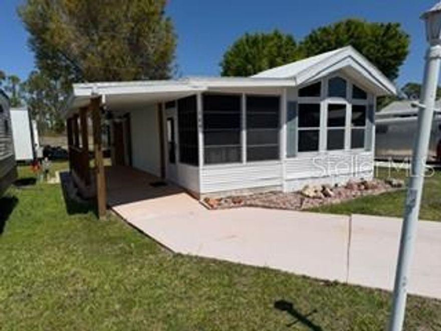 New Update!!!  The seller is willing to pay 6 months of 2026 lot lease.  Time to buy is now!!  Enjoy beautiful South Florida. Step into this well-maintained 1994, 1 bedroom, 1 bath manufactured home.  This beautiful home has a brand new outside porch and comes with a ceiling fan to keep the breeze flowing all year long. Also, recent update to flooring, along with 2021, or newer dishwasher, refrigerator and microwave.   The home comes fully furnished and move-in ready.  New couch and Chair in living area along with a fold out couch in the enclosed front area. The land rent is $765.00, which includes electric, water, sewer, lawn maintenance, pool, shuffleboard and use of clubhouse.  The park is also offering a great deal for snowbirds, who will only be living in Florida for 6 months or less. The total payment for the year is only $6,108!!  The home is minutes away from restaurant's, beaches, shopping and great hangouts.  The property is conveniently located between Punta Gorda and Ft Meyers. Whether you're seeking a cozy year-round residence or a low-maintenance seasonal retreat, this home delivers comfort, convenience, and value!
