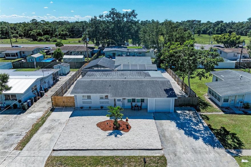 Completely Remodeled Sarasota Pool Home with Detached In-Law Suite!

Welcome to 5010 Lahaina Drive, a stunning, fully remodeled home that perfectly blends modern design with relaxed Florida living. Step inside to find a bright, open-concept floor plan featuring stylish finishes, updated flooring, and a beautifully renovated kitchen with sleek cabinetry, quartz countertops, and stainless steel appliances.

The heart of this home opens to a spacious screened-in patio and a sparkling private pool, creating an ideal setting for entertaining or simply soaking up the sunshine in total privacy.

A standout feature of this property is the detached in-law suite, complete with its own bedroom, bathroom, and fully equipped kitchen—perfect for extended family, guests, or generating rental income.

Located in a quiet, established Sarasota neighborhood close to downtown, shopping, dining, and the area’s world-famous Siesta Key beaches, this move-in-ready home offers flexibility, comfort, and exceptional value, ideal for multigenerational living or rental income. Your perfect Sarasota retreat or investment opportunity awaits.