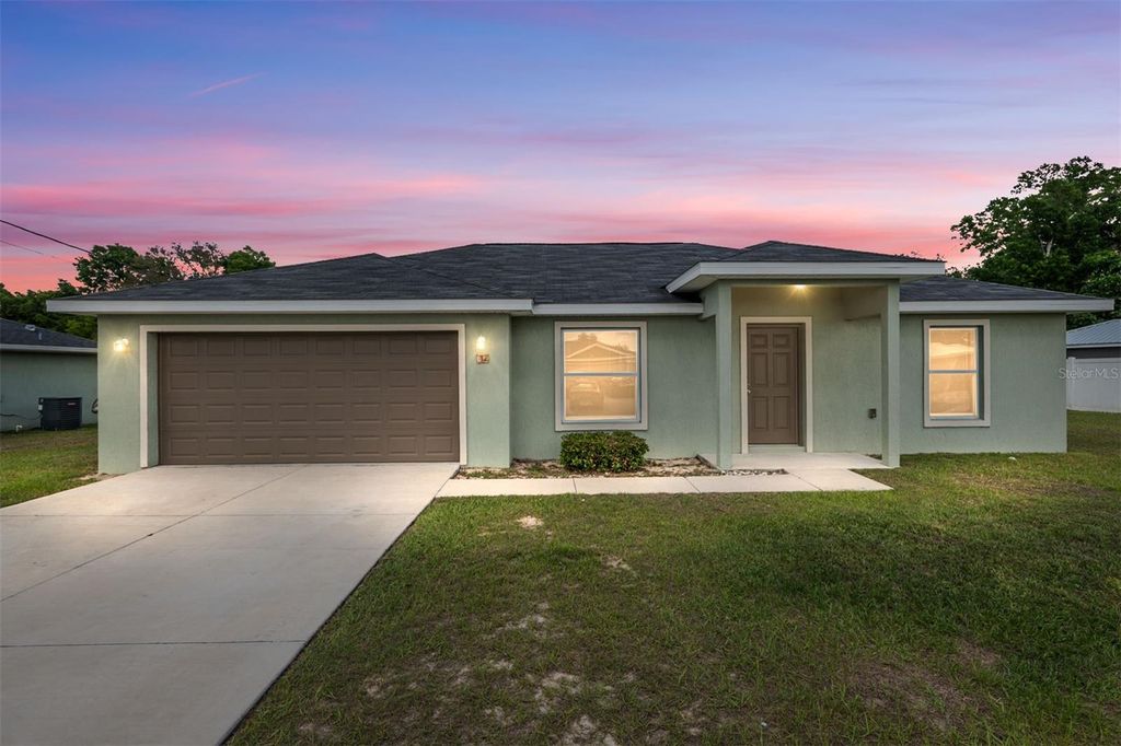 Photo of 22 Juniper Loop Circle, Ocala, FL 34480 (MLS # OM721997)