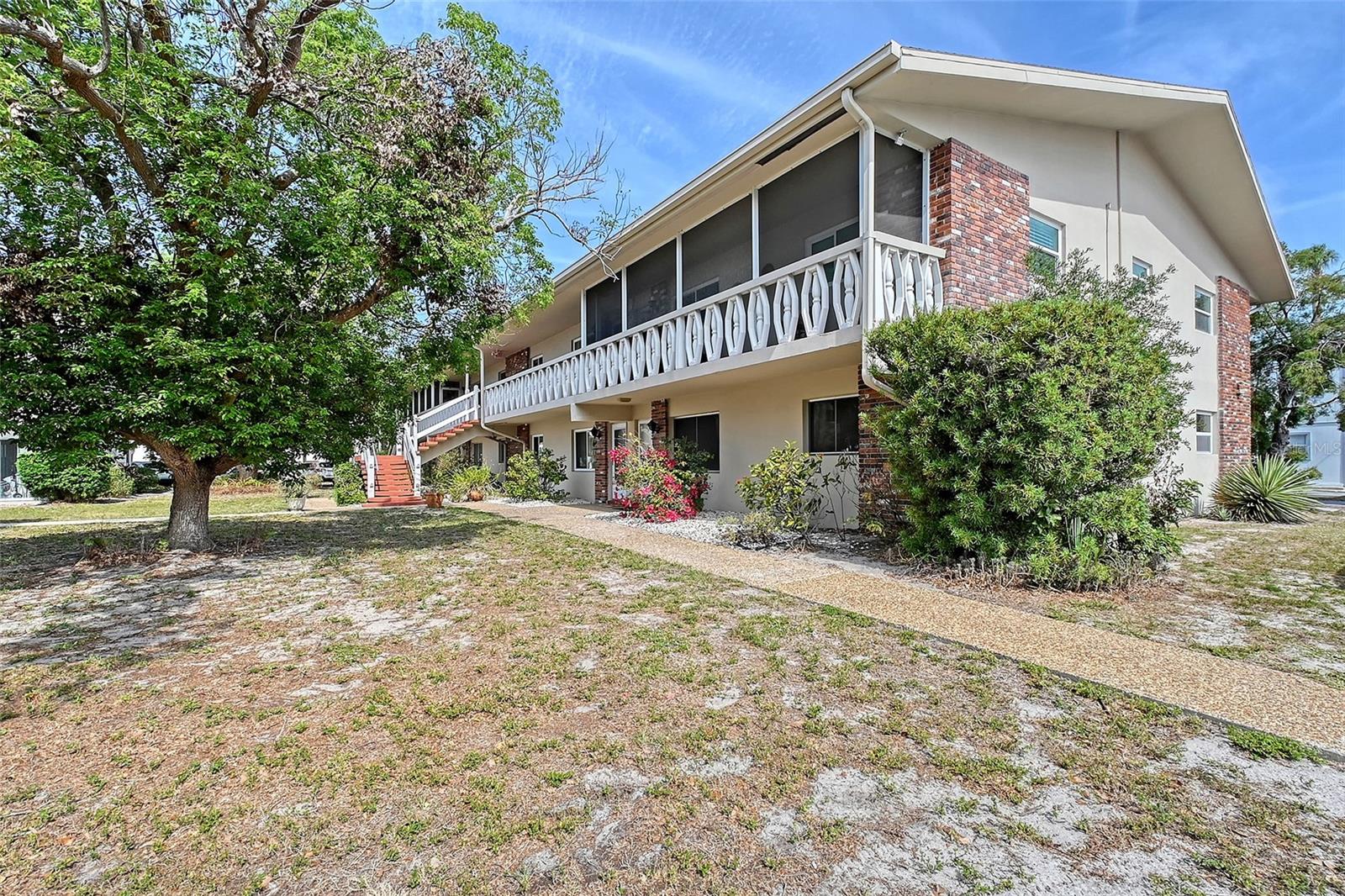 Imagine your Florida retreat! This inviting 2-bedroom, 2-bath ground-floor condo in the 55+ Sunland Garden Apts offers a relaxed lifestyle with generous room sizes and seamless tile flooring. A new AC ensures your comfort. Step outside to the community pool with a grill, socialize in the clubhouse, and appreciate the convenience of on-site laundry and assigned parking. Best of all, you're just moments away from the sugar-white sands of Siesta Key and the vibrant culture of downtown Sarasota.