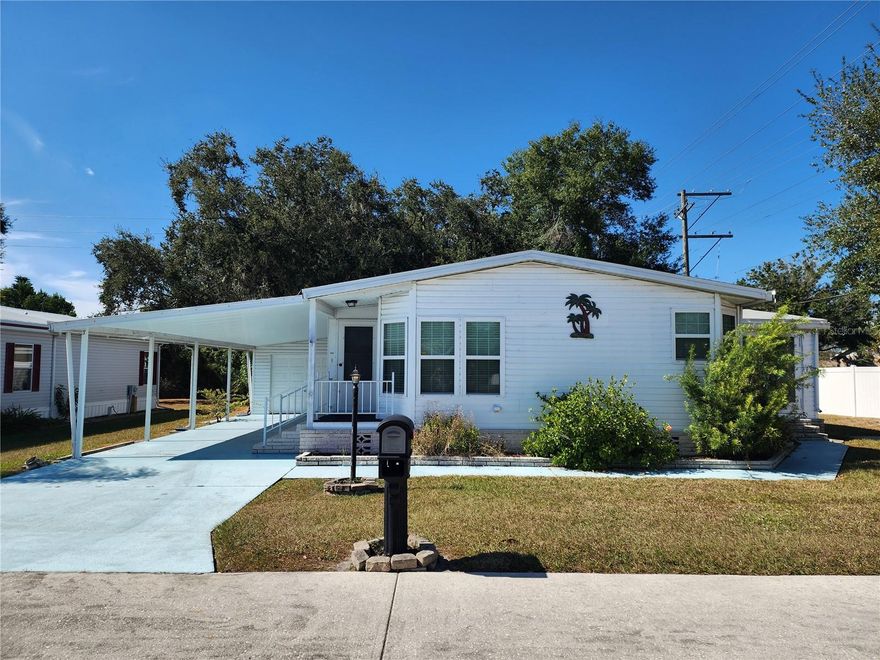 Become a share holder in this highly sought after 55+ gated community. If you are looking for the perfect retirement home, this one is for you! Located in Orange Manor West, it is one of the most popular 55+ communities in Winter Haven and surrounding area with many amenities. Pool, shuffle board, putt putt, horse shoes, crochet, bingo, lake access and much more. Legoland is around one mile away which is great for visiting family. This is a 1596 Square ft. 2 bedroom 2 bath 1991 Palm Harbor mobile home with an attached enclosed Florida room. The king size master bedroom has a walk-in closet and a private bathroom with step in shower. It has an inside utility room with washer & dryer and a desk. The monthly maintenance fee is $284.50 a month which includes cable, internet, trash pickup, and amenities. This house is fully furnished and ready to move in. This is also a pet free community. While it is a great winter home get away, it can also be a year round retirement home. Come see it today. This one won't last long. All measurements are approximate and should be verified by the buyer.