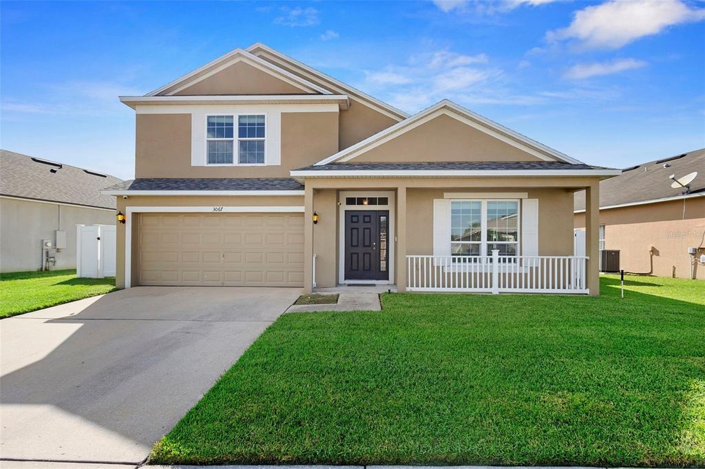 Photo of 3067 Dasha Palm Drive, Kissimmee, FL 34744 (MLS # O6333924)