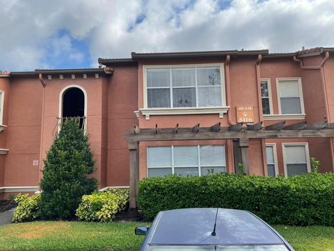 Photo of 5116 Conroy Road #411, Orlando, FL 32811 (MLS # O6316325)
