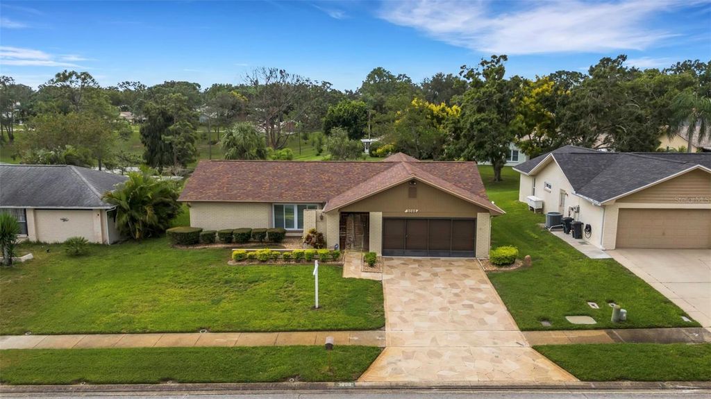 Photo of 3098 E Dorchester Drive, Palm Harbor, FL 34684 (MLS # TB8433251)