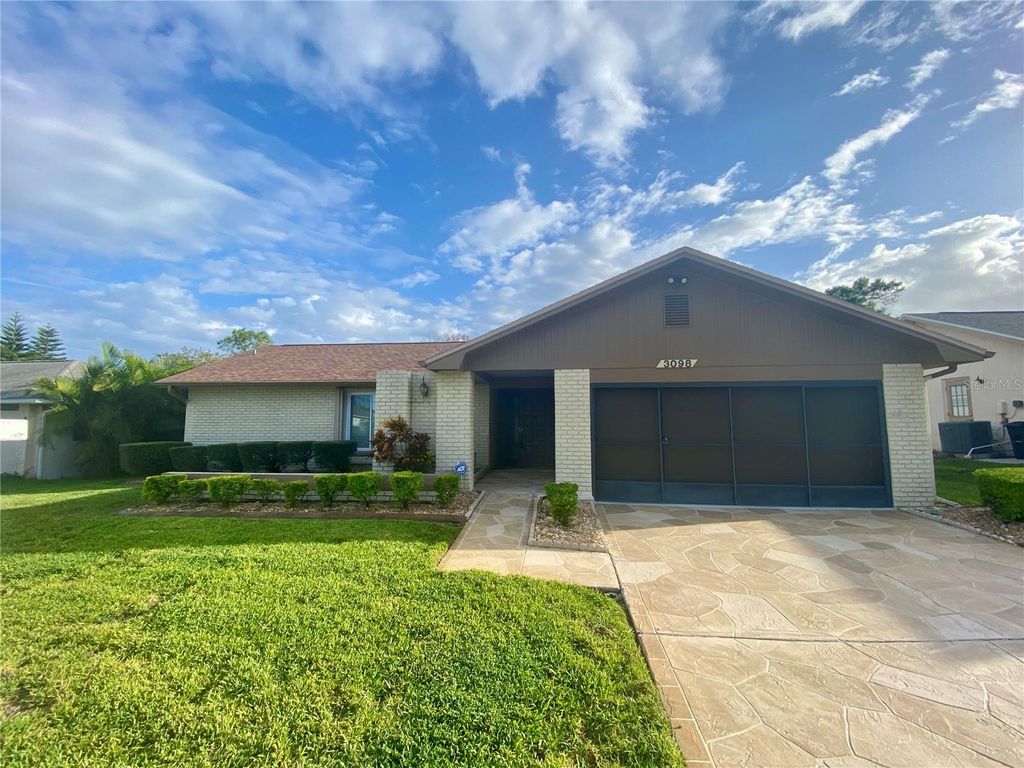Photo of 3098 E Dorchester Drive, Palm Harbor, FL 34684 (MLS # TB8433251)