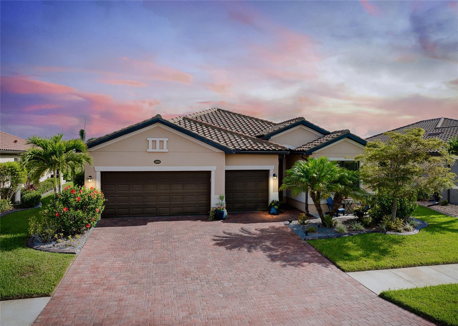 <b>Welcome to 13634 Vancanza Drive!</b> — a stunning 4-bedroom, 3-bathroom home located in the highly sought-after community of <b>Gran Paradiso</b> in Venice, Florida. This elegant residence features over <b>2,292 square feet</b> of beautifully designed living space and a thoughtfully planned open layout ideal for both everyday comfort and entertaining.
Step inside and be greeted by an oversized kitchen that’s truly the heart of the home—complete with wrap-around granite countertops, abundant cabinetry, a spacious breakfast nook, and plenty of room for gathering. The open-concept great room flows effortlessly from the kitchen, making it the perfect space to relax or host guests.
The <b>primary suite</b> is a private retreat, featuring serene lake views, a <b>massive walk-in closet</b>, and a generously sized en-suite bath. Each guest bedroom provides ample space, natural light, and privacy, while the three full bathrooms ensure convenience for family and visitors alike.
Enjoy Florida living at its finest on the <b>recently extended, pavered lanai</b>, where you can unwind while overlooking a peaceful water view teeming with local wildlife. Whether sipping your morning coffee or entertaining in the evening, this tranquil space is a true highlight of the home.
Gran Paradiso is a <b>golf cart-friendly, gated community</b> loaded with amenities—including a luxurious resort-style pool, state-of-the-art fitness center, pickleball and tennis courts, saunas, a clubhouse, and a full calendar of social events and activities.
Located just minutes from world-class beaches, dining, shopping, and the Wellen Park district, this home places you in the heart of Southwest Florida living.
<b>Don't miss your chance to live in one of Venice’s most desirable communities with unbeatable amenities and lakeside tranquility!</b> 1 Year Home Warranty Included!