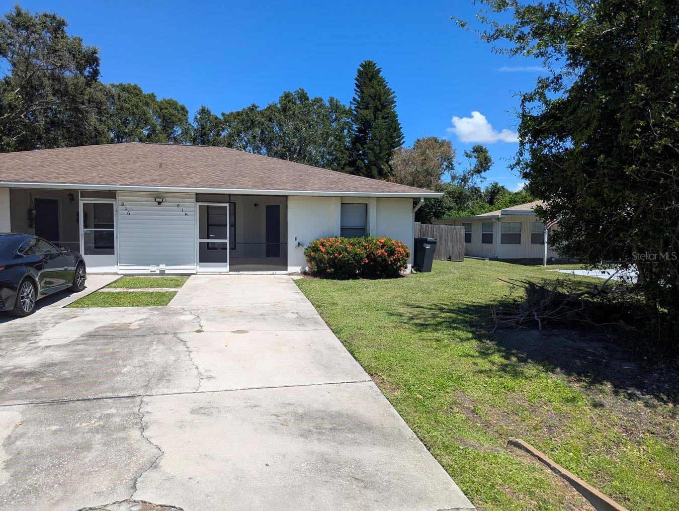 * Nicely appointed block built villa-style home with private off-street parking. Located in a quiet neighborhood on a quiet cul de sac. Great commute location! * Fully fenced rear yard. * Freshly painted interior and new tile * Nicely updated kitchen with closet pantry. Appliances include flat top range, dishwasher and refrigerator with ice-maker. * No carpet anywhere - fully tiled! * Ensuite bedroom with spacious walk-in closet and sliders to the lovely fully enclosed lanai. * Second bedroom is located next to the guest bathroom for added convenience. * Large, safe, fenced yard with mature trees providing ultimate privacy with no overlooking neighbors. External storage shed. * Screened front porch and private laundry with washer and dryer. * YARD CARE & PEST CONTROL IS INCLUDED
Annual lease only. Credit, background and rental history checks will be required. SMALL dog may be negotiable. MULTIPLE LARGE DOGS WILL NOT BE APPROVED. Sorry, no cats.