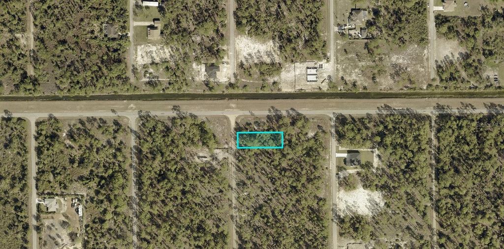 Photo of 1124 Johns Avenue, Lehigh Acres, FL 33972 (MLS # A4692547)