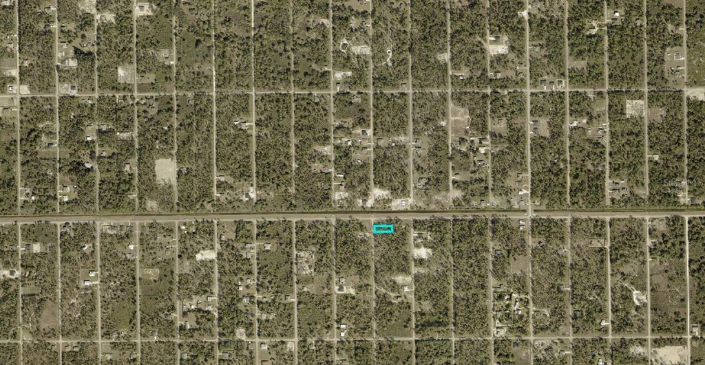 Photo of 1124 Johns Avenue, Lehigh Acres, FL 33972 (MLS # A4692547)
