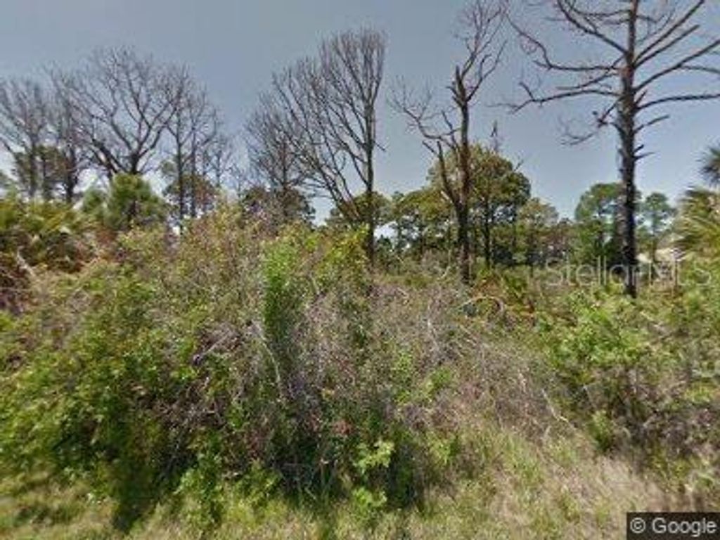 Photo of 149 Maltby Street, Port Charlotte, FL 33953 (MLS # C7463634)