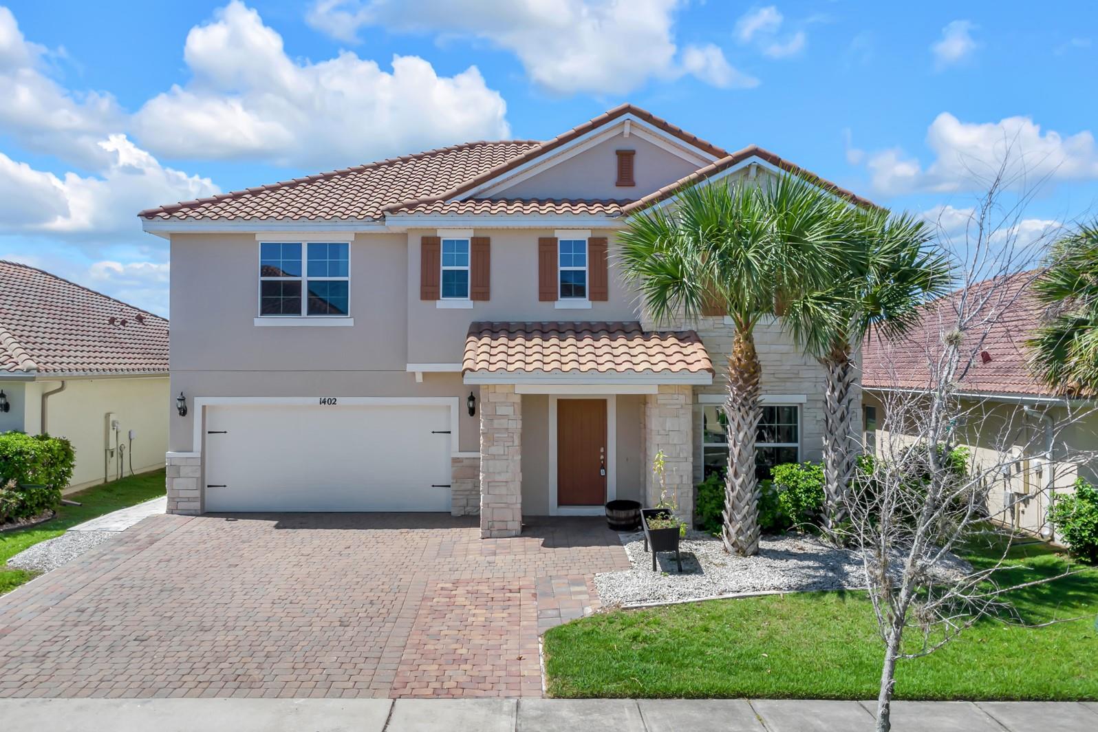 Priced to sell 5-bedroom and 3 bathroom in the guard-gated community of Bellalago is move-in ready and perfect for homeowners or investors. The entire interior has been freshly painted giving the home a bright, clean feel. The open living room, dining area, and kitchen, along with one bedroom are located on the first floor. Up on the second floor, you'll find 4 more bedrooms, an oversized laundry room, and a bonus living area, which is perfect for movie nights or second living room. The primary suite features a double-vanity bathroom with a separate shower and jacuzzi tub, and a huge walk-in closet that is sure to make your friends jealous. There's chance for a upgrade to install a pool in the large backyard, which can be fenced with approval from the HOA. Bellalago's lively community offers all you could want, from resort style pools to miles of shaded walking and biking paths, and, for boaters, Lake Toho access. Restaurants, shopping, and grocery stores are all within a 5 minute drive, and Disney is just 35 minutes away. Don't miss your chance to make this incredible property yours!